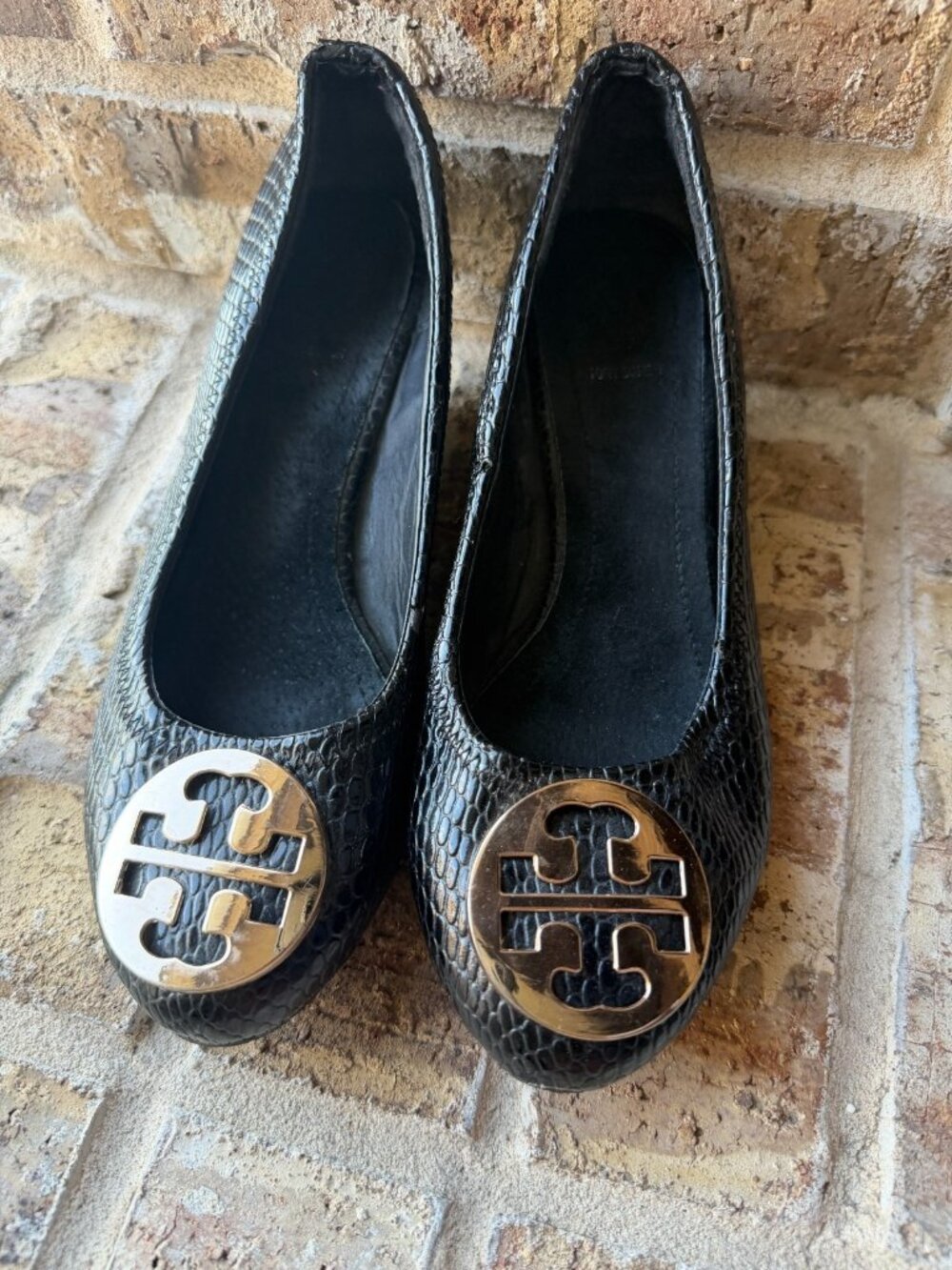 Tory Burch Reva wedges feature black python-embossed leather size 38